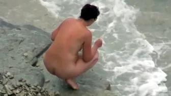 she is peeing in the water near the beach, Voyeur Collection, PissRIP